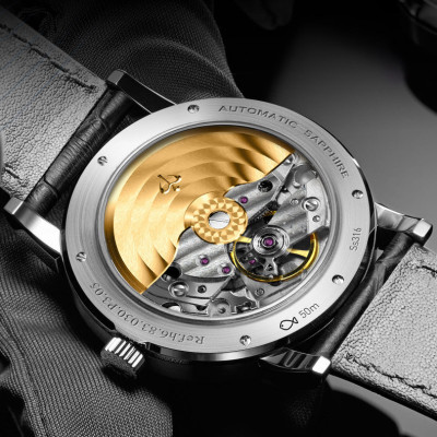 Đồng hồ nam Poniger P305-2 Chính hãng ,Kính sapphire nguyên khối ,chống xước,chống nước 50m,mặt xanh navy vỏ trắng dây da nâu ( đen) xịn,vỏ máy thép không gỉ 316L,Đồng hồ cơ (Automatic) bảo hành 24 tháng, hàng mới 100%,thiết kế trẻ trung và sang trọng