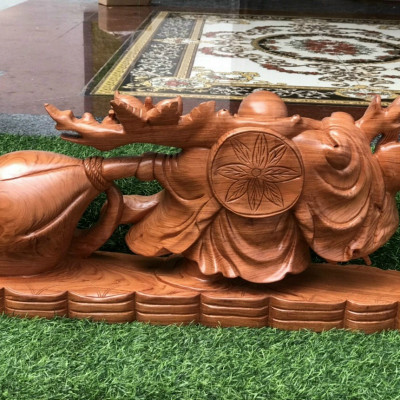 Tượng phật di lặc kéo bao tiền vàng bằng gỗ hương đá kt 60×30×14cm 