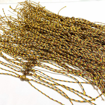 Vòng tay hạt Trầm Tốc tết dây chỉ ngũ sắc - Bình An, May Mắn