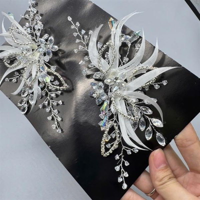 Cài tóc cô dâu lông vũ trắng hết hạt hoa pha lê mới t12/2024