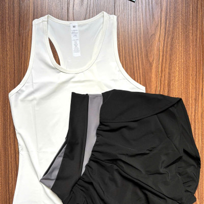 Bộ đồ thể thao nữ gồm áo ba lỗ khoét lưng và quần đùi 2 lớp hàng Quảng Châu cao cấp