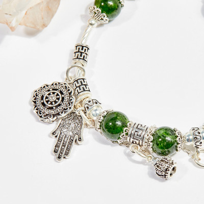 Vòng tay phong thủy nữ đá diopside charm kim quy 8mm mệnh hỏa , mộc - Ngọc Quý Gemstones