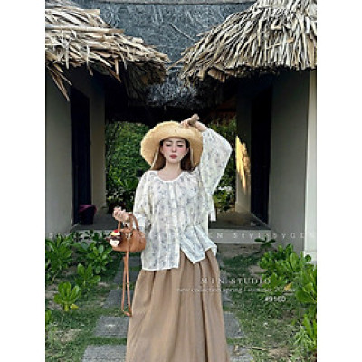 Set thiết kế áo tay dài phồng mix chân váy dáng xoè